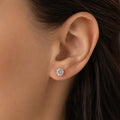 10K yellow gold 5mm round CZ stud earring worn on ear showing scale and everyday fit