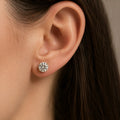 10K yellow gold 6mm round CZ stud earring worn on ear showing larger scale and everyday fit