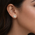 14k yellow gold flower cz stud earrings worn on ear with sparkling round stones luxury jewelry gift