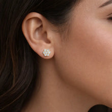 14k yellow gold flower cz stud earrings worn on ear with sparkling round stones luxury jewelry gift