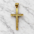 Back of the 14K two-tone gold crucifix pendant showing crosshatch texture and the corpus mounting pins