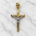 Front of a 14K two-tone gold crucifix pendant with a white gold corpus on a polished grooved cross