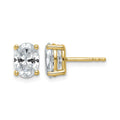 Front and side views of oval lab grown diamond stud earrings in 14K yellow gold, showing four-prong basket settings and a post.