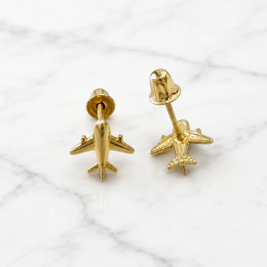 14K yellow gold airplane screw back stud earrings front and back view on marble surface