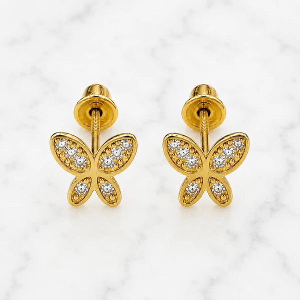 14K yellow gold CZ butterfly screw back stud earrings with clear stones and beaded wing details on marble surface