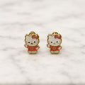 14K yellow gold enamel cat screw back stud earrings with white and red enamel details on marble surface