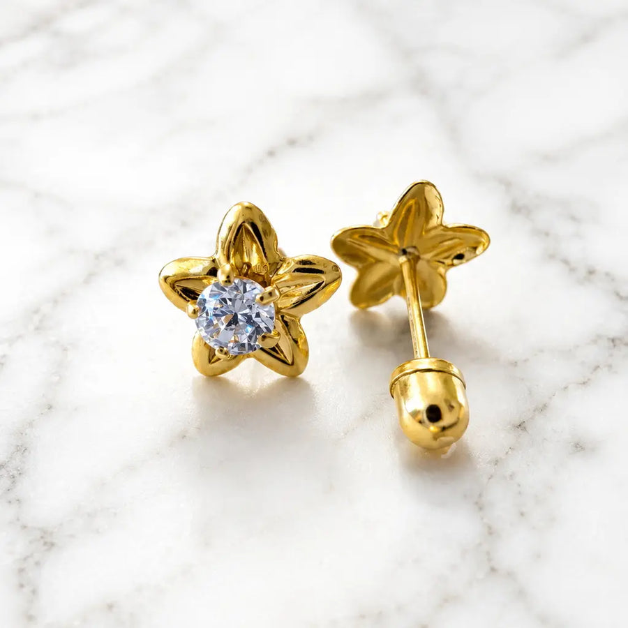 14K yellow gold flower CZ stud earrings front and back view on marble showing round CZ center and screw-back closure