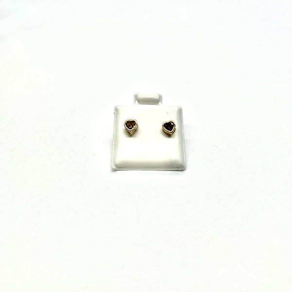14K yellow gold heart-shaped purple CZ bezel stud earrings on display card on white background