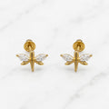14K yellow gold dragonfly screw back stud earrings with marquise CZ wings on marble surface