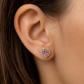 14K yellow gold pink CZ heart halo stud earring worn on ear showing size and sparkle