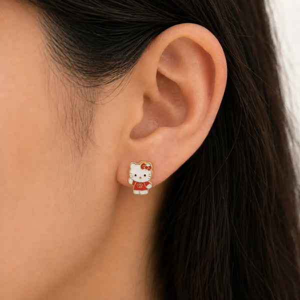 14K yellow gold red bow cat enamel stud earring worn on ear showing petite everyday fit