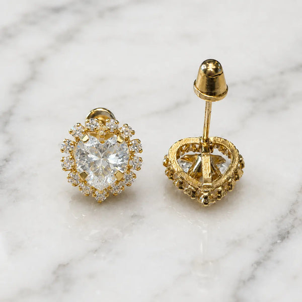 14K yellow gold white CZ heart halo screw back stud earrings front and back view on marble surface