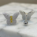 Sterling silver butterfly pavé CZ stud earrings front and back view on marble showing screw-back closure and yellow CZ body stones