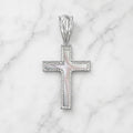 Sterling silver crucifix cross pendant back view with polished bail and smooth light-toned reverse on white background