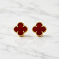 Sterling silver gold-tone red clover stud earring worn on ear showing 12mm quatrefoil size