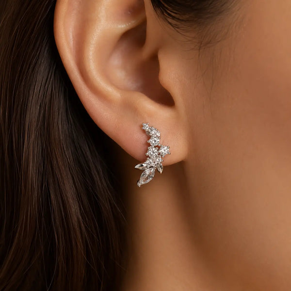 Sterling silver marquise CZ floral stud earring worn on ear showing 17.5mm drop design