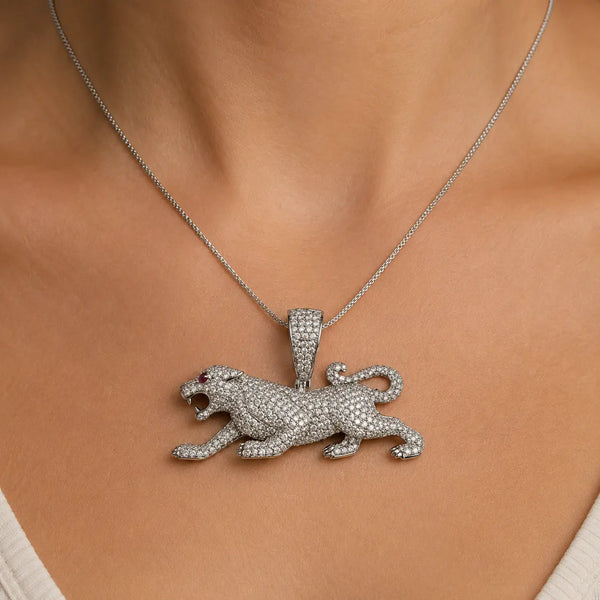 Sterling silver panther pendant with clear pavé CZ worn on a thin chain showing size and fit