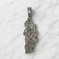Sterling silver Saint Jude pendant back view showing openwork design and CZ bail on marble surface