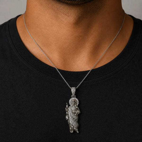 Sterling silver Saint Jude CZ pendant worn on chain showing size and fit on neckline