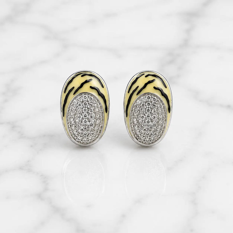 Sterling silver tiger stripe oval earrings with pavé cubic zirconia front view on white background