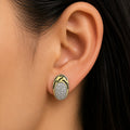 Sterling silver tiger stripe pavé CZ earrings worn on ear showing size and fit
